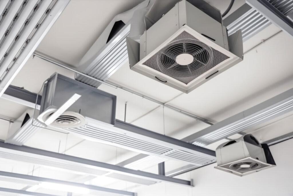 Large, white air systems on the ceiling of an El Paso property.